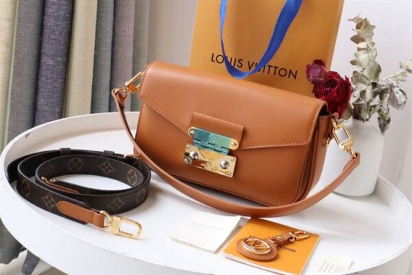 Louis Vuitton Swing Handbag - LH126