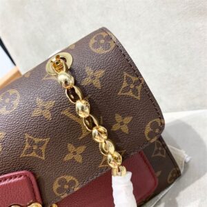 Louis Vuitton Victoire Monogram Handbag - LH193