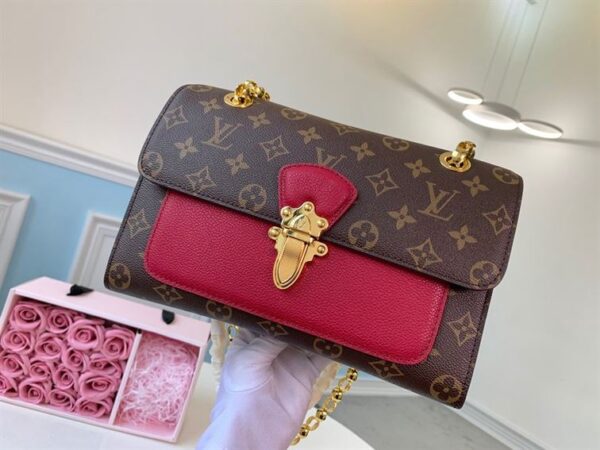 Louis Vuitton Victoire Monogram Handbag - LH193