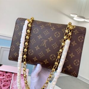 Louis Vuitton Victoire Monogram Handbag - LH193