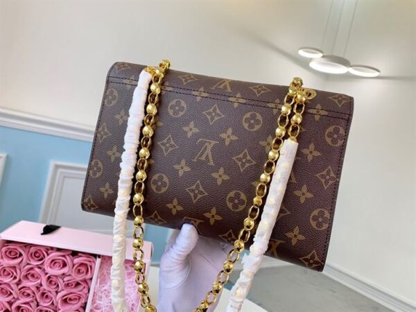 Louis Vuitton Victoire Monogram Handbag - LH193